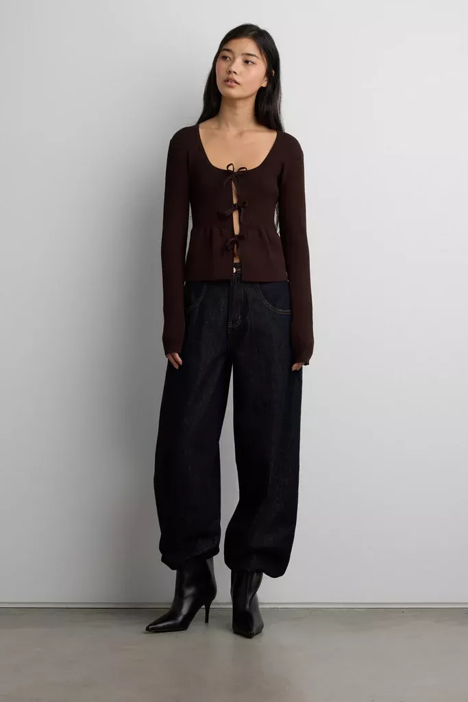 RIBBED TIE FRONT PEPLUM SWEATER